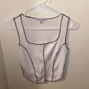 White Tank Top With Exposed Brown Stitching